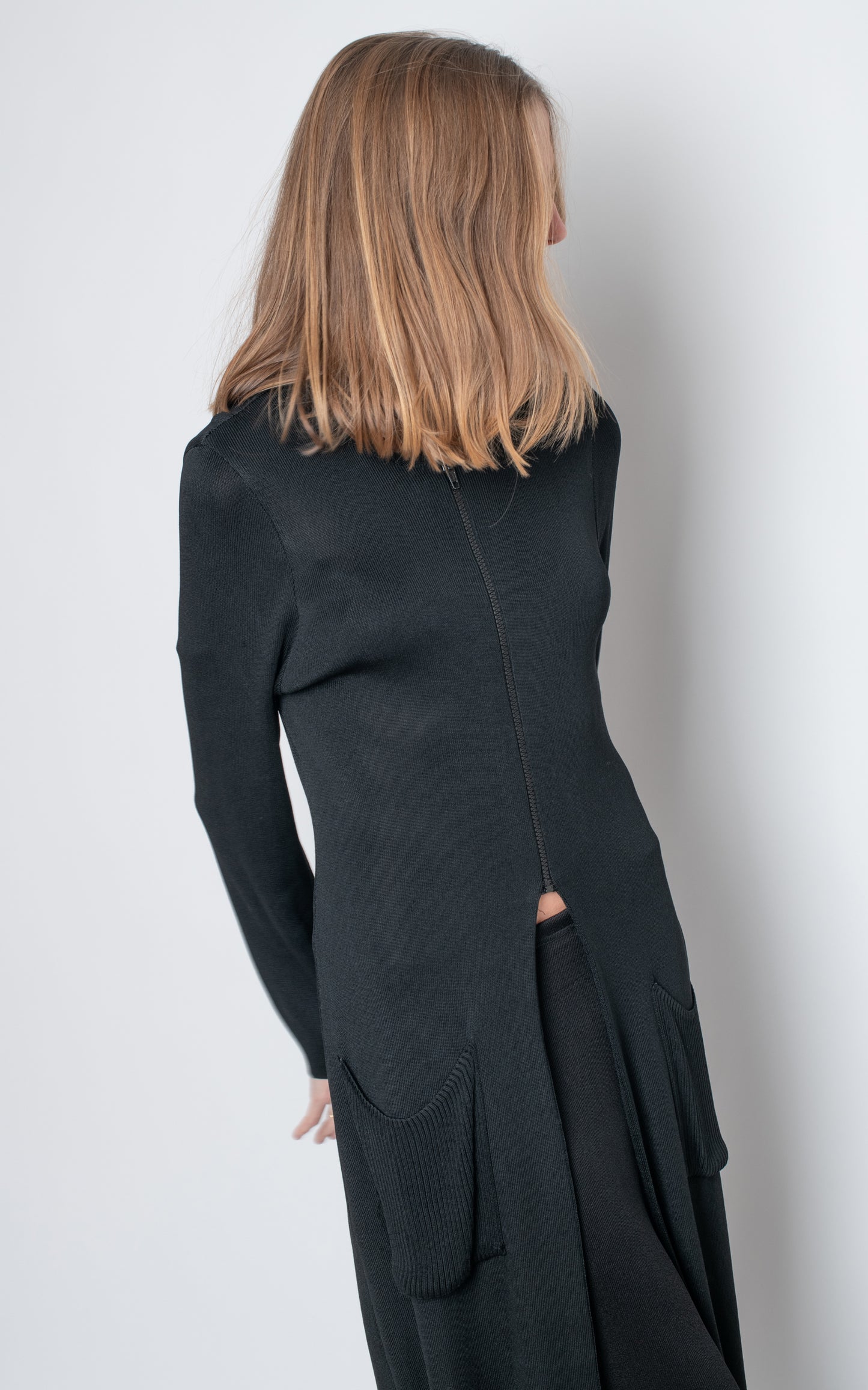 Conjunto chaqueta larga y falda de punto