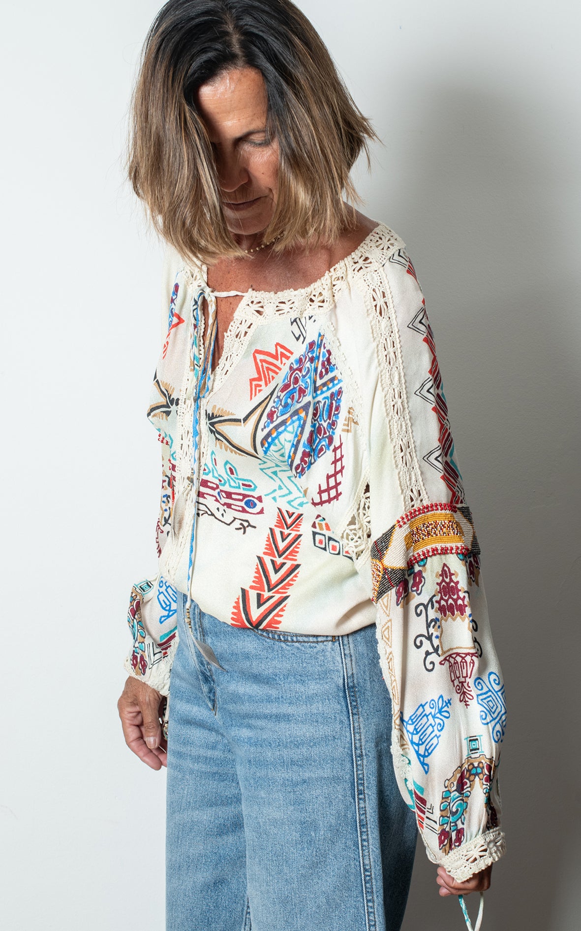 Camisa con abalorios