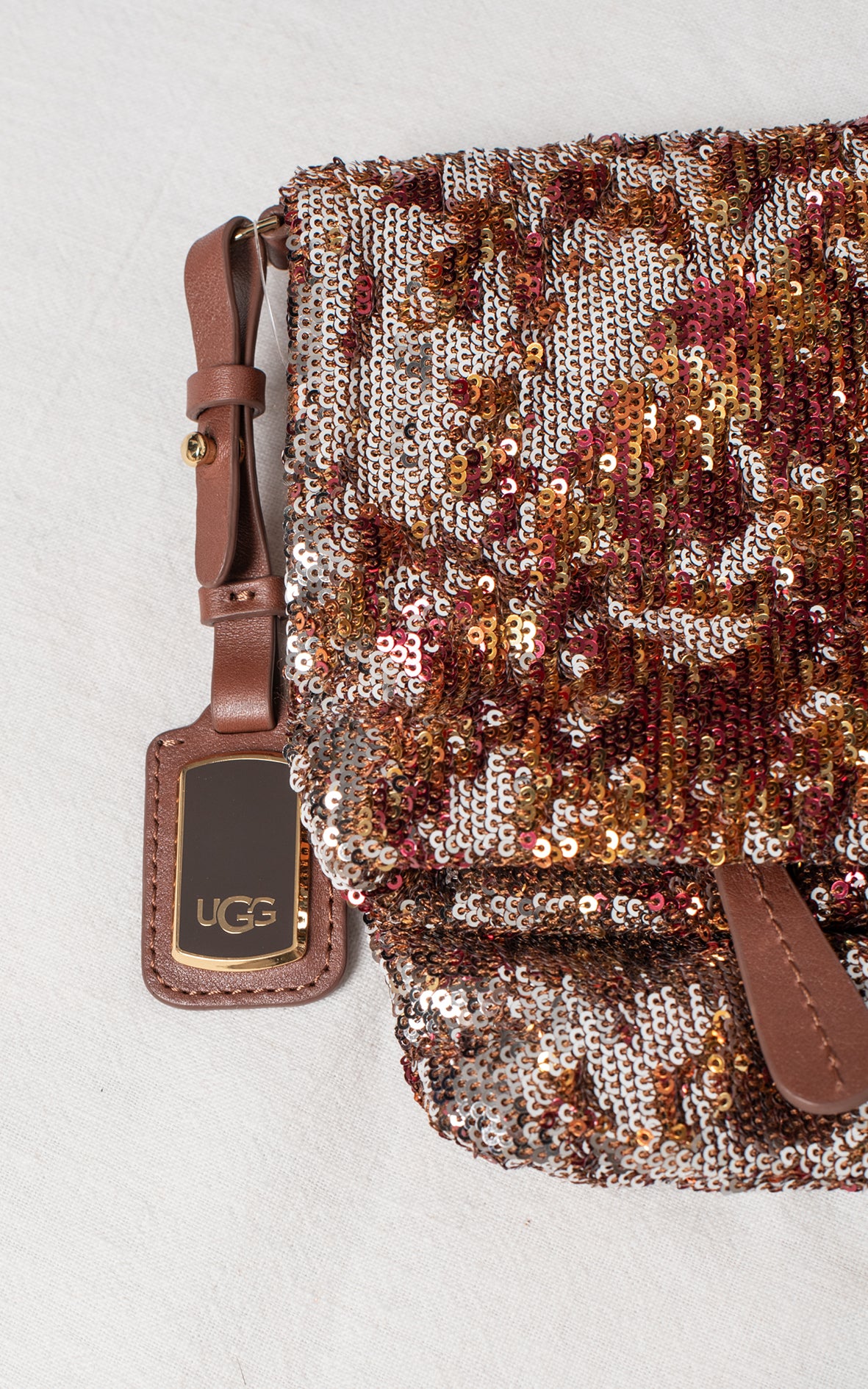 Bolso sobre lentejuelas teja