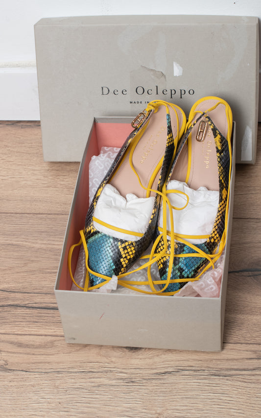 Zapatos de punta de serpiente