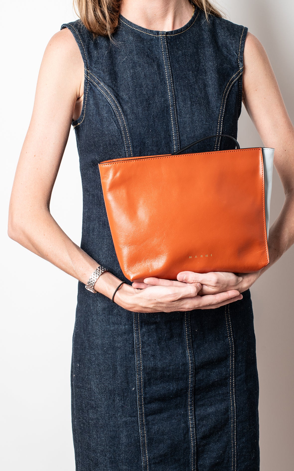 Clutch de piel teja y azul