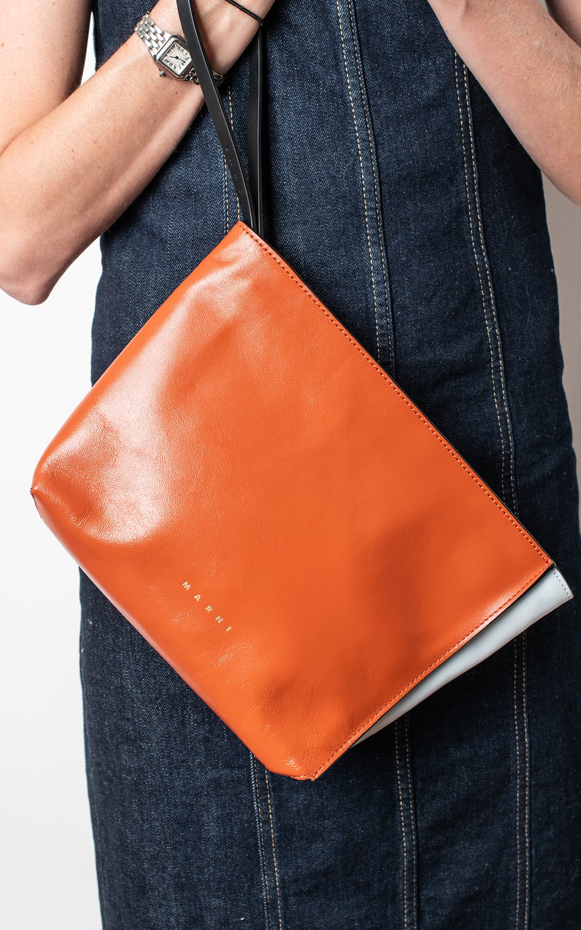 Clutch de piel teja y azul