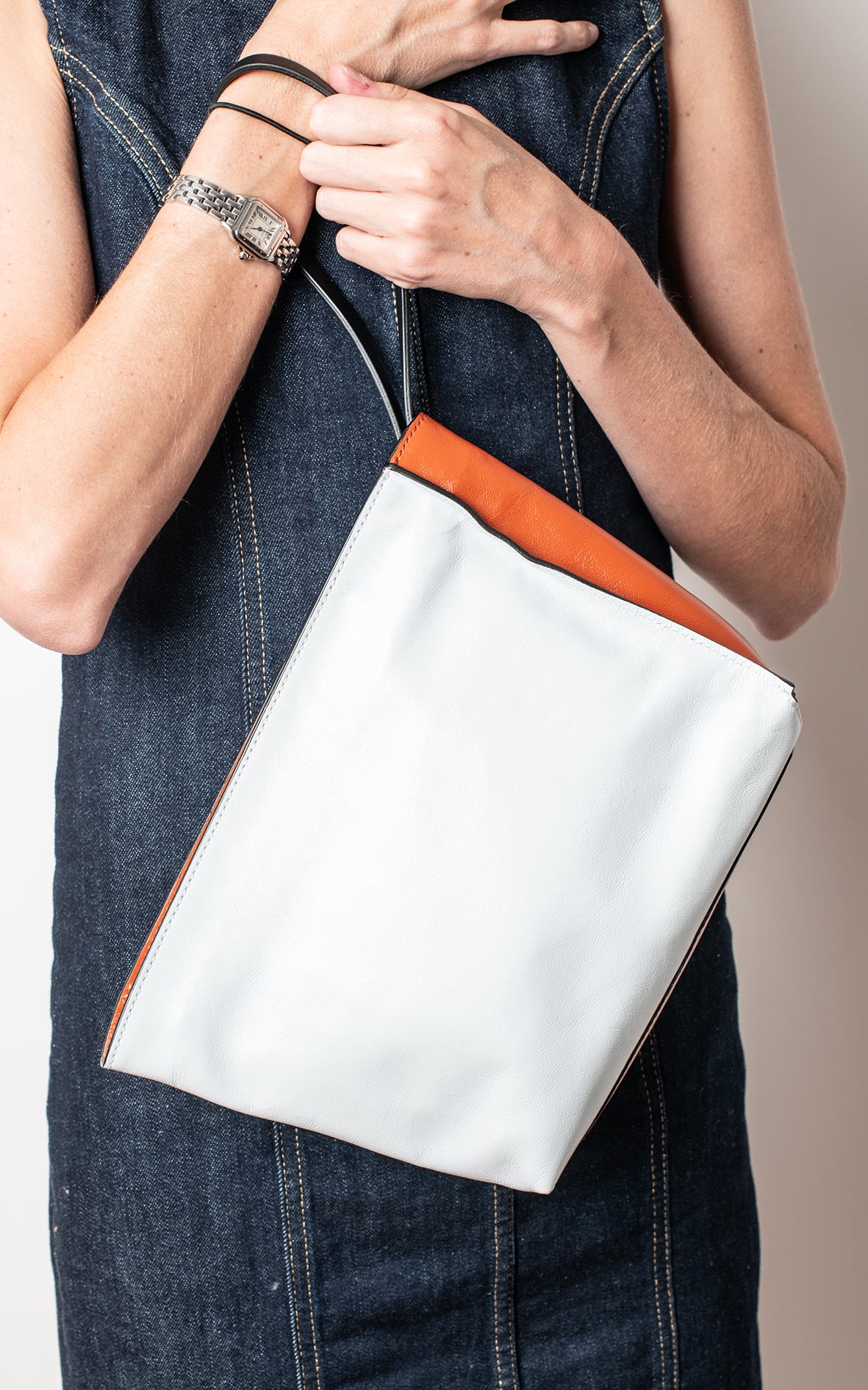 Clutch de piel teja y azul