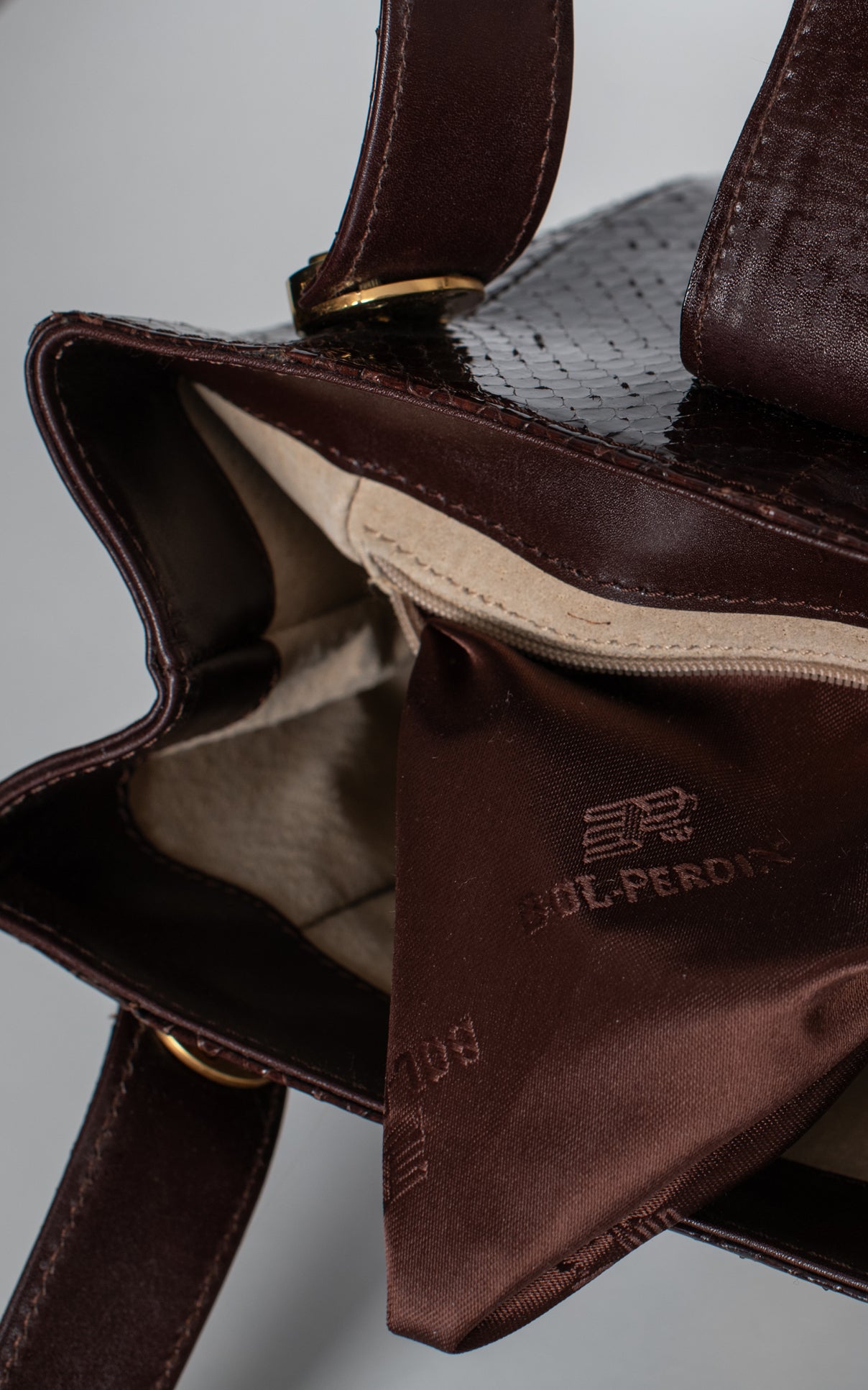 Bolso de cocodrilo marron