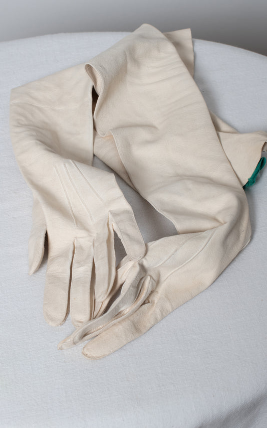 Guantes blancos de piel
