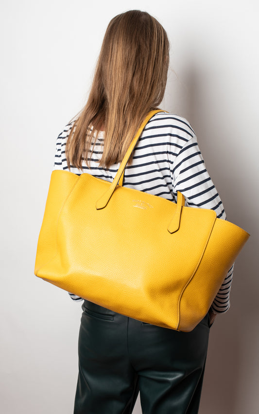 Bolso mostaza Gucci Swing