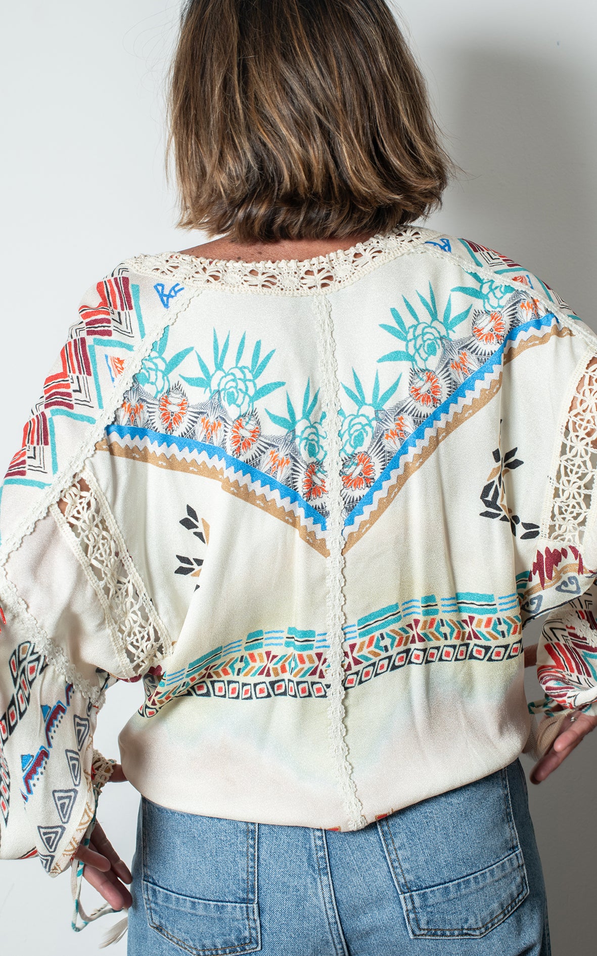 Camisa con abalorios