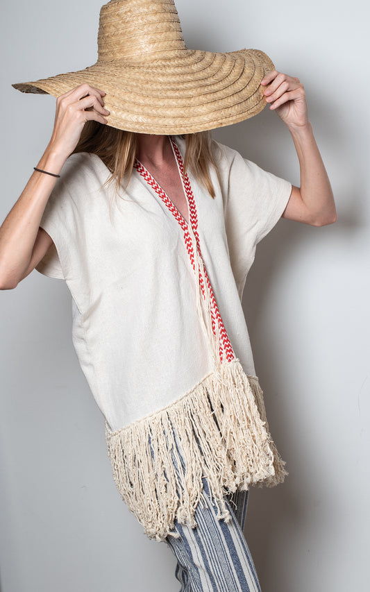 Poncho crudo