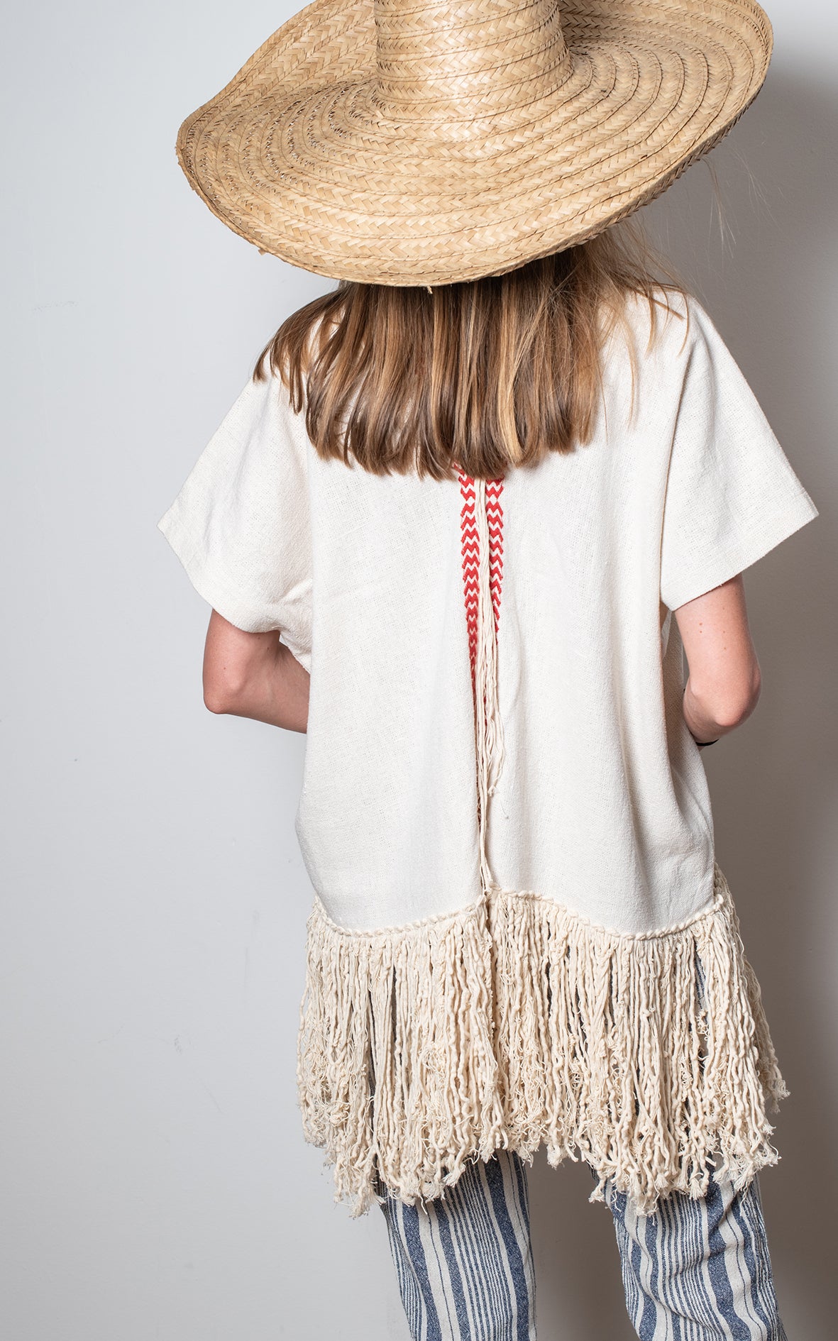 Poncho crudo