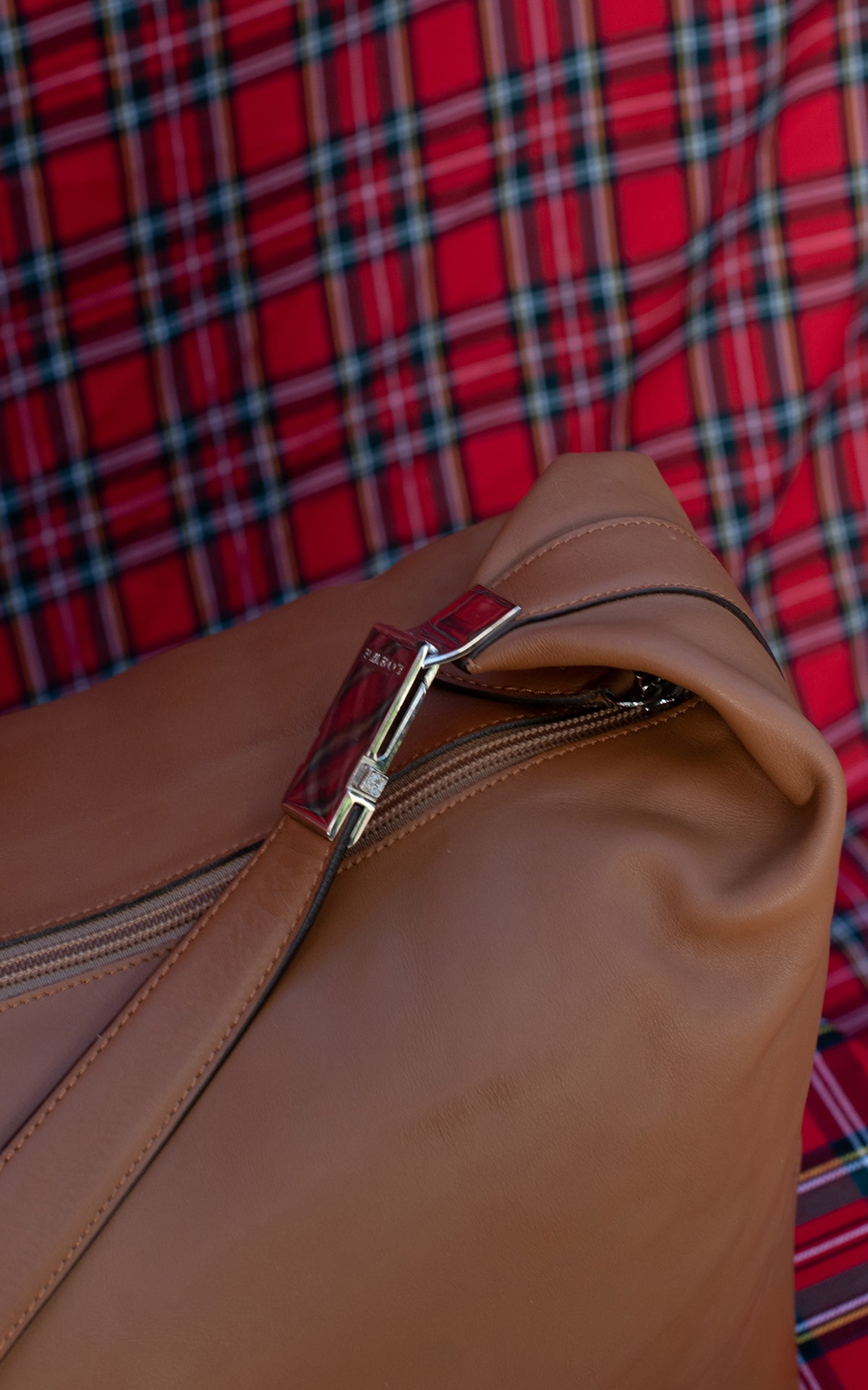 Bolsa de viaje marrón de piel