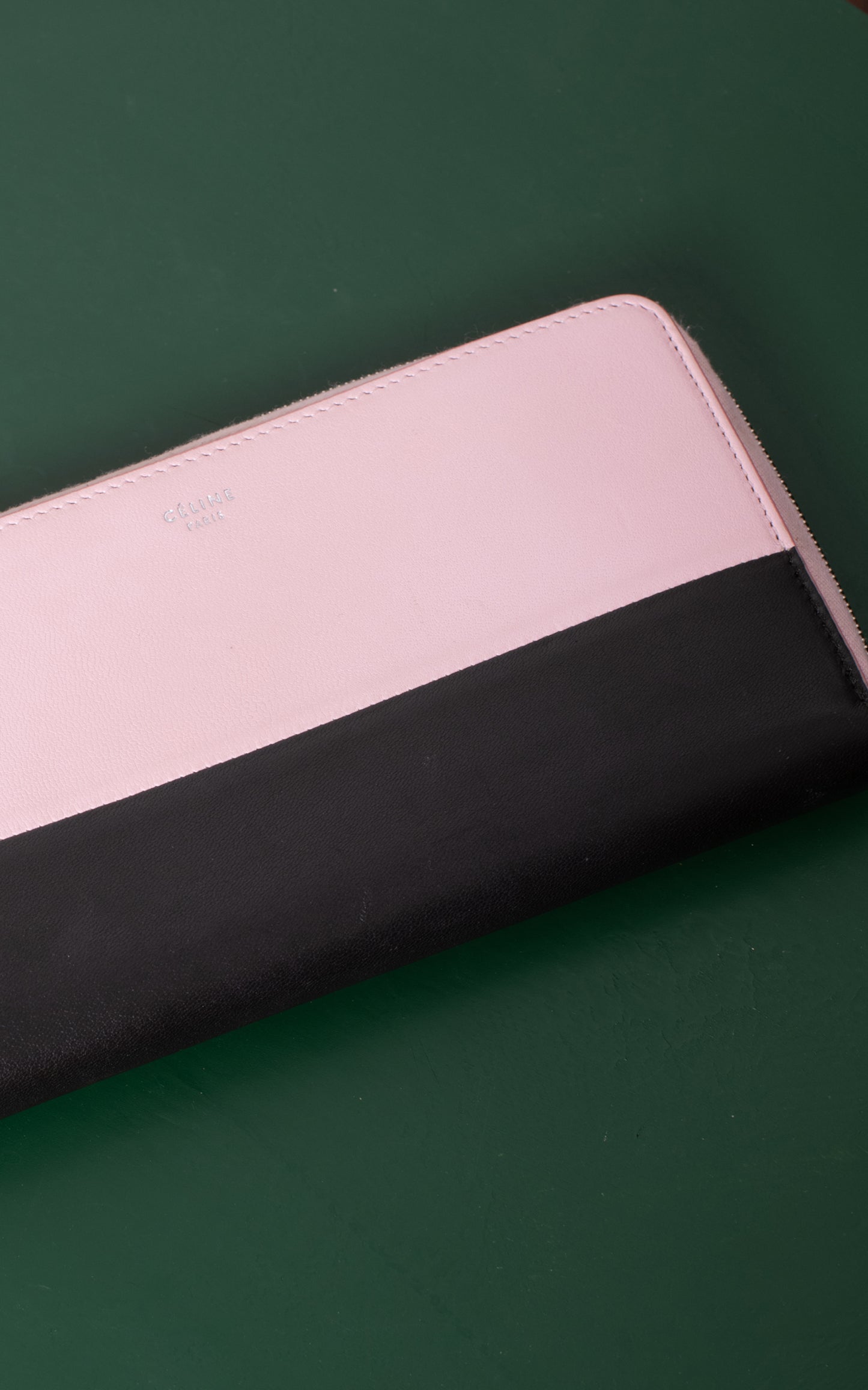 Cartera rosa y negra