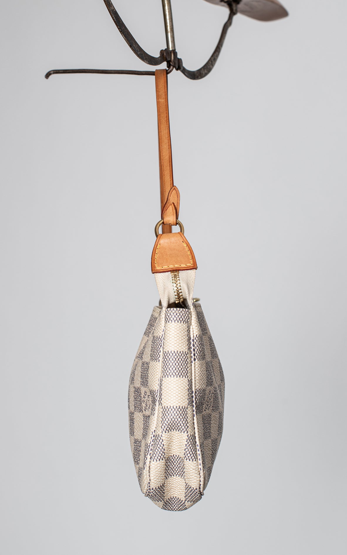 Bolso pochette damero