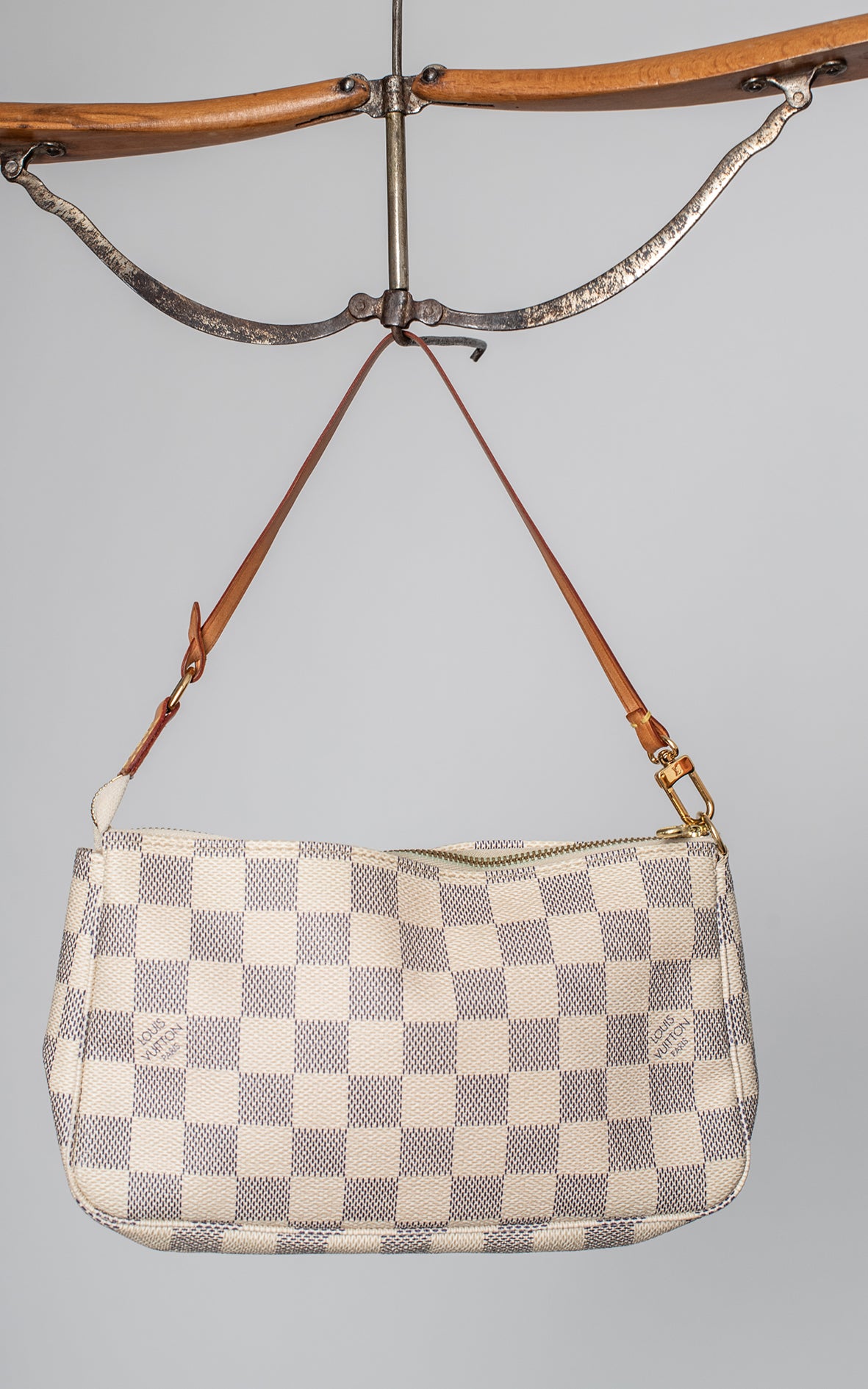 Bolso pochette damero