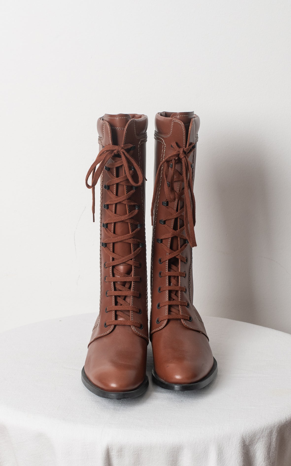 Botas altas de cordones